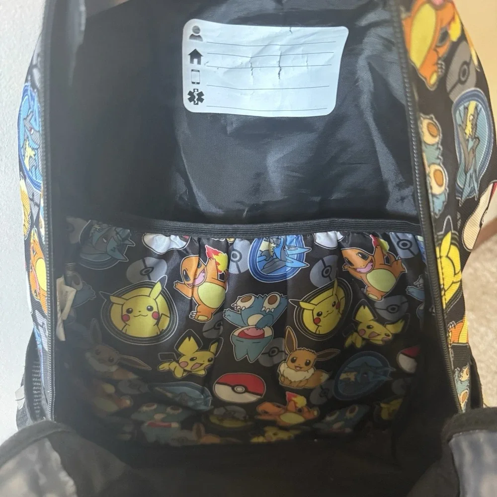 Bioworld Pokemon Backpack Featuring Pikachu Eevee Charmander Munchlax